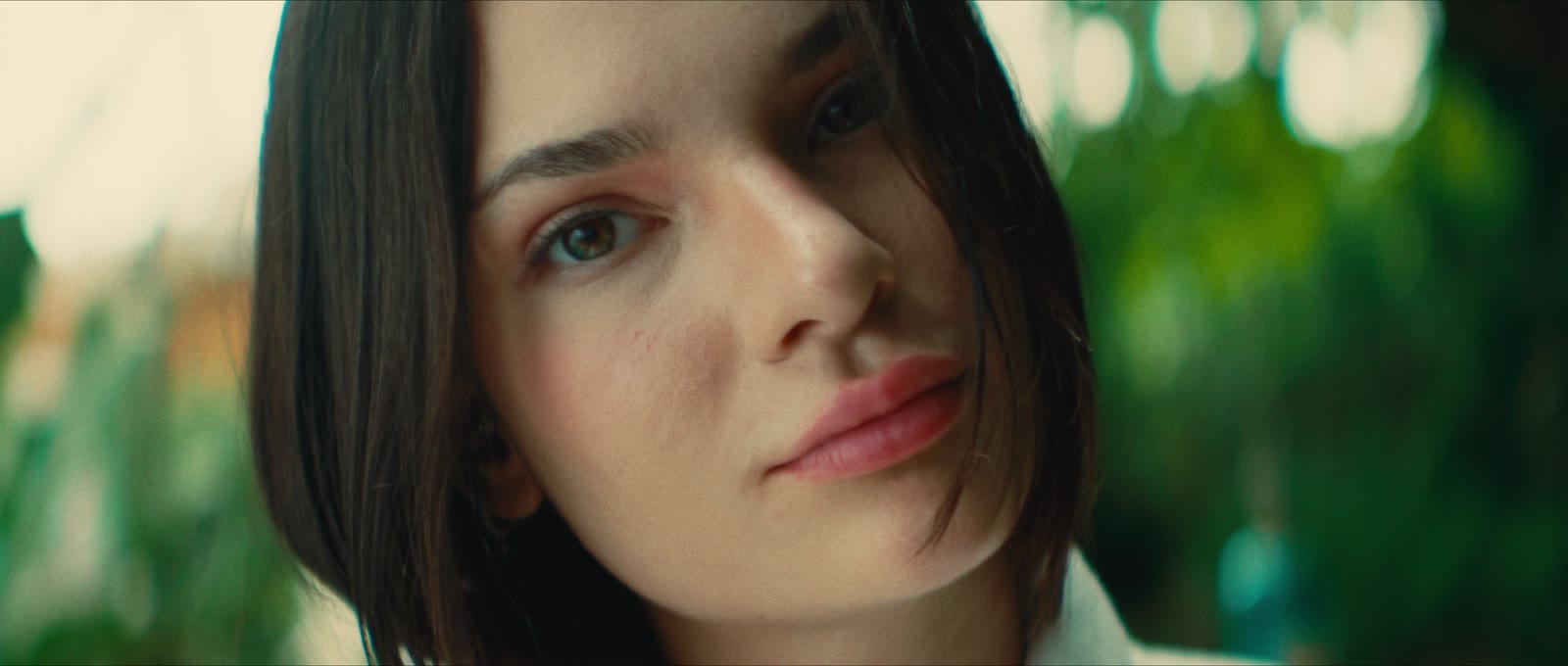 A portrait shot on anamorphic, desqueezed to a wide scope frame